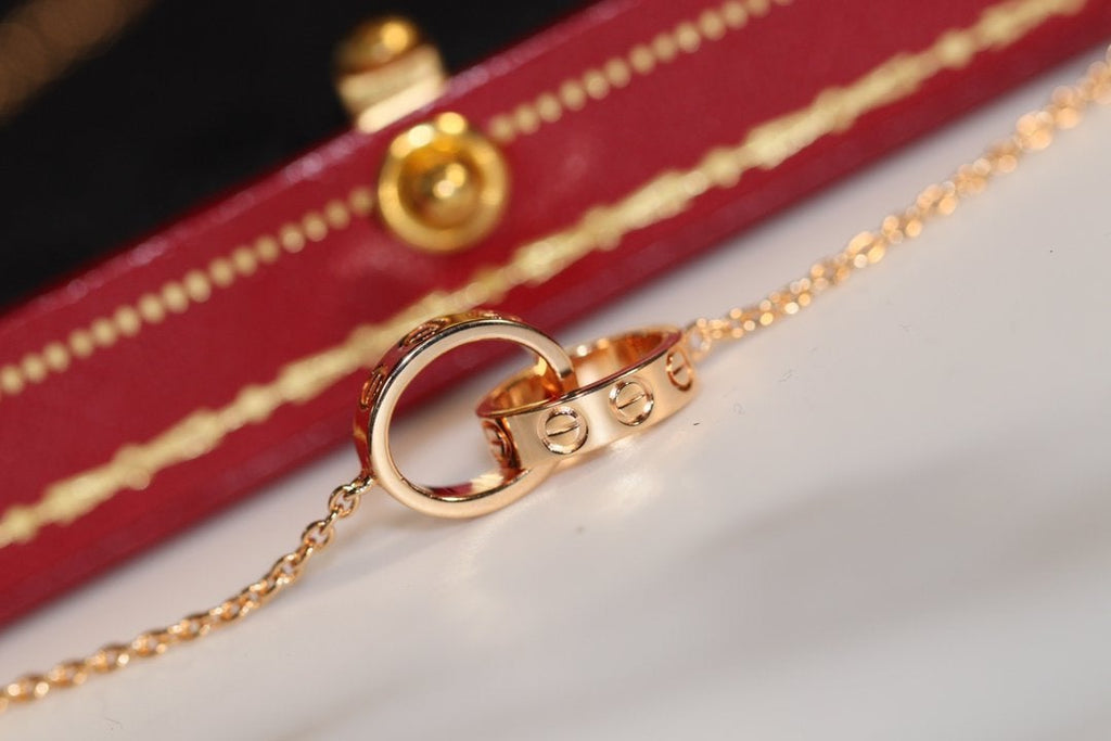 {
  "Elowen jewels": "Elowen jewels",
  "LOVE NECKLACE PINK GOLD AND SILVER": "LOVEネックレス ピンクゴールド＆シルバー"
}