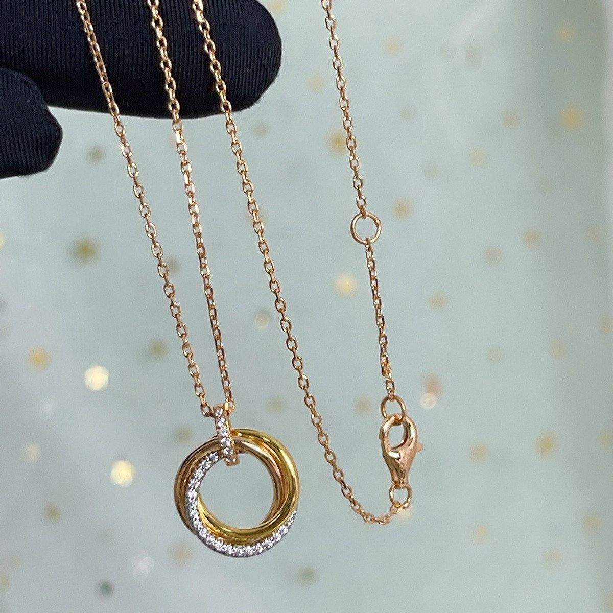 {
  "Elowen jewels": "Elowen jewels",
  "TRINITY NECKLACE SILVER GOLD PINK GOLD DIAMONDS": "トリニティ ネックレス シルバー・ゴールド・ピンクゴールド ダイヤモンド"
}