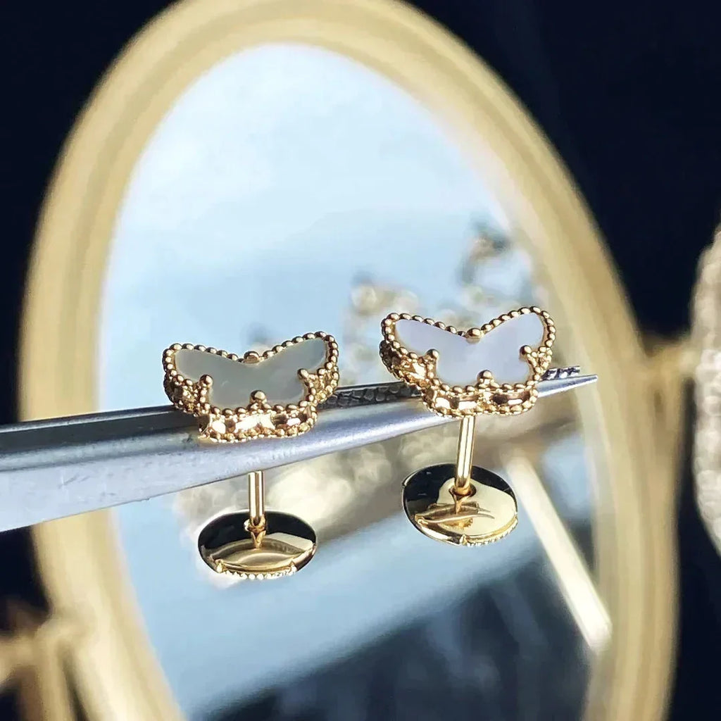 {
  "Elowen jewels": "Elowen jewels",
  "SWEET BUTTERFLY MOP EARSTUDS": "スウィート バタフライ マザーオブパール ピアス"
}
