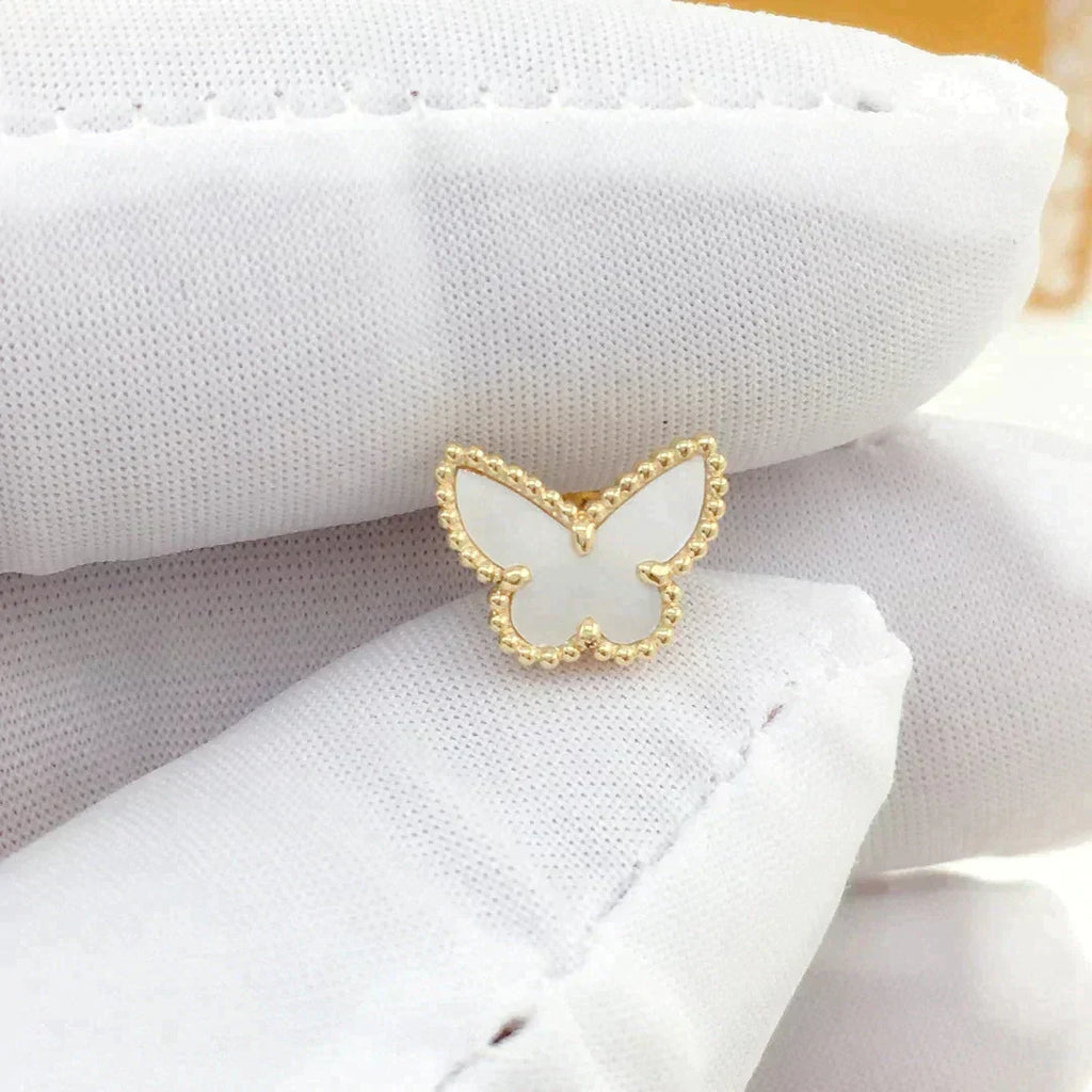 {
  "Elowen jewels": "Elowen jewels",
  "SWEET BUTTERFLY MOP EARSTUDS": "スウィート バタフライ マザーオブパール ピアス"
}