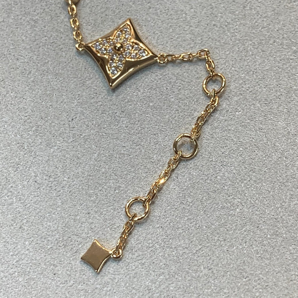 {
  "Elowen jewels ": "Elowen jewels ",
  "STAR AND SUN 4 MOTIFS GOLD DIAMONDS BRACELET": "スター＆サン 4モチーフ ゴールドダイヤモンドブレスレット"
}