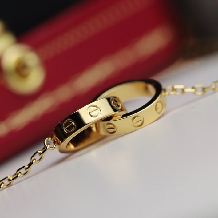 {
  "Elowen jewels": "Elowen jewels",
  "LOVE NECKLACE DOUBLE RING GOLD": "LOVE ネックレス ダブルリング ゴールド"
}