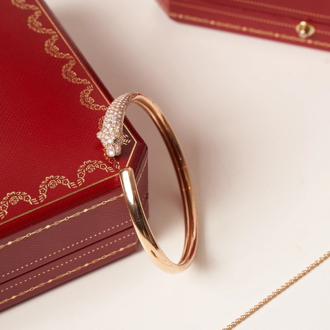 {
  "Elowen jewels": "[Elowen Schmuck]",
  "PANTHERE ROSE GOLD DIAMOND OPEN BRACELET": "PANTHERE ARMBAND OFFEN ROSÉGOLD DIAMANT"
}