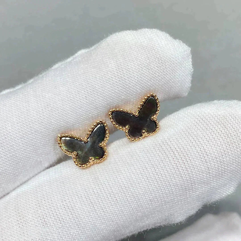 {
"Elowen jewels": "Elowen jewels",
"BUTTERFLY DARK MOP  EARRINGS": "BUTTERFLY DUNKLE PERLMUTT-OHRRINGE"
}