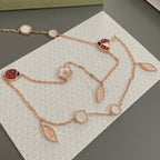 {
  "Elowen jewels": "Elowen Schmuck",
  "LUCKY SPRING 15 MOTIFS ROSE GOLD NECKLACE": "LUCKY SPRING HALSKETTE MIT 15 MOTIVEN IN ROSÉGOLD"
}
