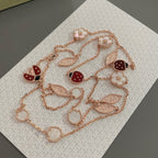 {
  "Elowen jewels": "Elowen Schmuck",
  "LUCKY SPRING 15 MOTIFS ROSE GOLD NECKLACE": "LUCKY SPRING HALSKETTE MIT 15 MOTIVEN IN ROSÉGOLD"
}