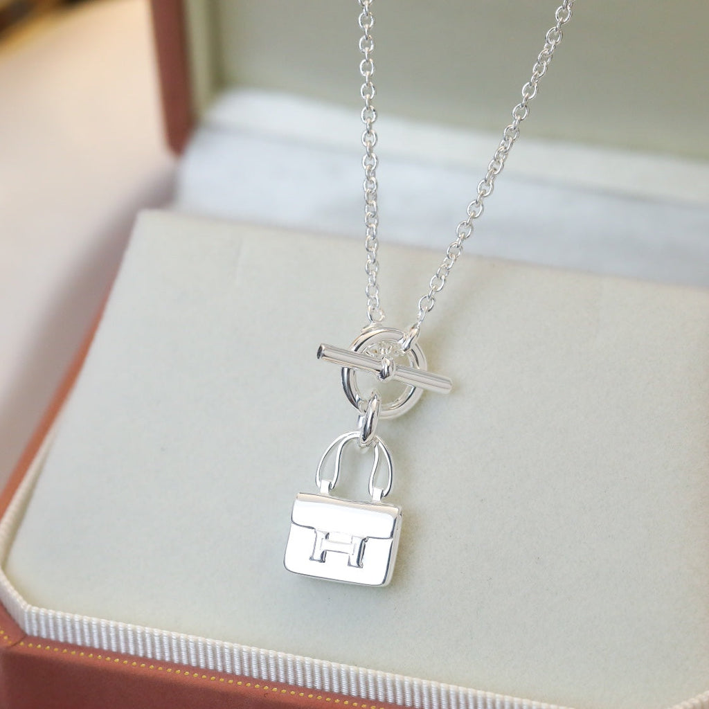 {
  "Elowen jewels": "エロウェン・ジュエルズ",
  "POP H PEDANT SILVER NECKLACE": "ポップH ペンダント シルバーネックレス"
}