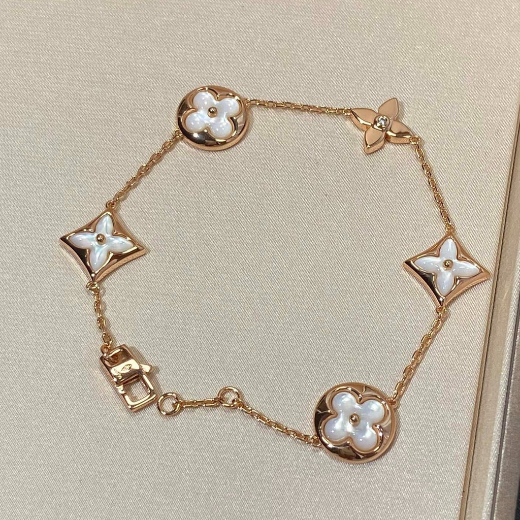 {
  "Elowen jewels": "Elowen jewels",
  "STAR AND SUN 5 MOTIF MOP PINK GOLD BRACELET": "スター＆サン 5モチーフ マザーオブパール ピンクゴールド ブレスレット"
}