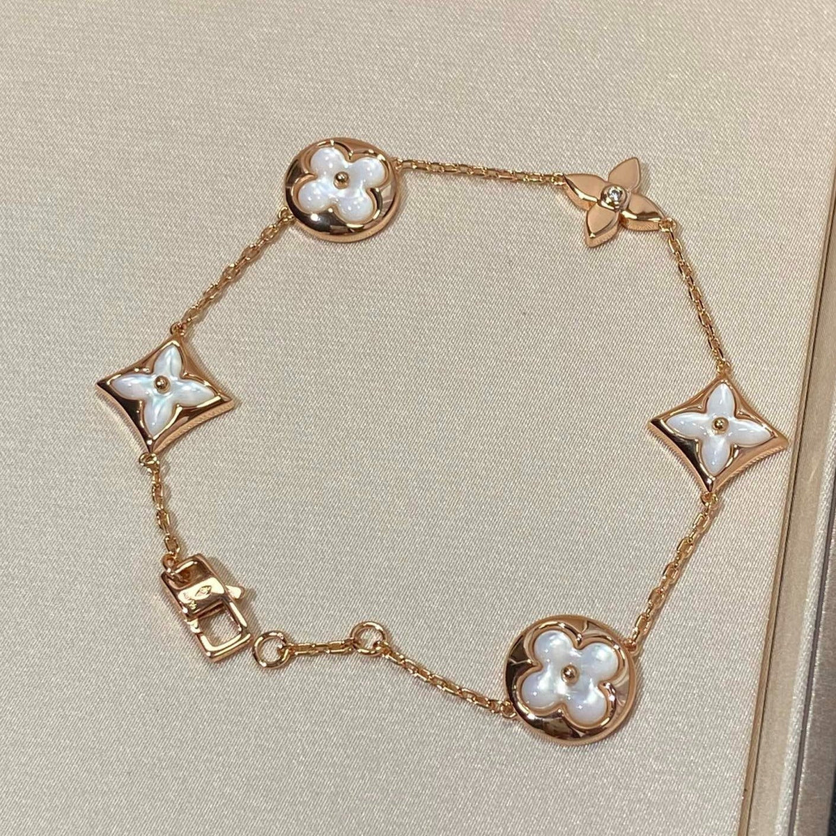 [Elowen jewels ]STAR AND SUN 5 MOTIF MOP PINK GOLD BRACELET