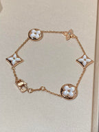 {
  "Elowen jewels": "Elowen jewels",
  "STAR AND SUN 5 MOTIF MOP PINK GOLD BRACELET": "スター＆サン 5モチーフ マザーオブパール ピンクゴールド ブレスレット"
}