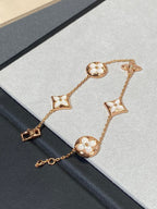 {
  "Elowen jewels": "Elowen jewels",
  "STAR AND SUN 5 MOTIF MOP PINK GOLD BRACELET": "スター＆サン 5モチーフ マザーオブパール ピンクゴールド ブレスレット"
}