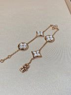 {
  "Elowen jewels": "Elowen jewels",
  "STAR AND SUN 5 MOTIF MOP PINK GOLD BRACELET": "スター＆サン 5モチーフ マザーオブパール ピンクゴールド ブレスレット"
}