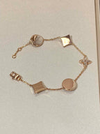 {
  "Elowen jewels": "Elowen jewels",
  "STAR AND SUN 5 MOTIF MOP PINK GOLD BRACELET": "スター＆サン 5モチーフ マザーオブパール ピンクゴールド ブレスレット"
}