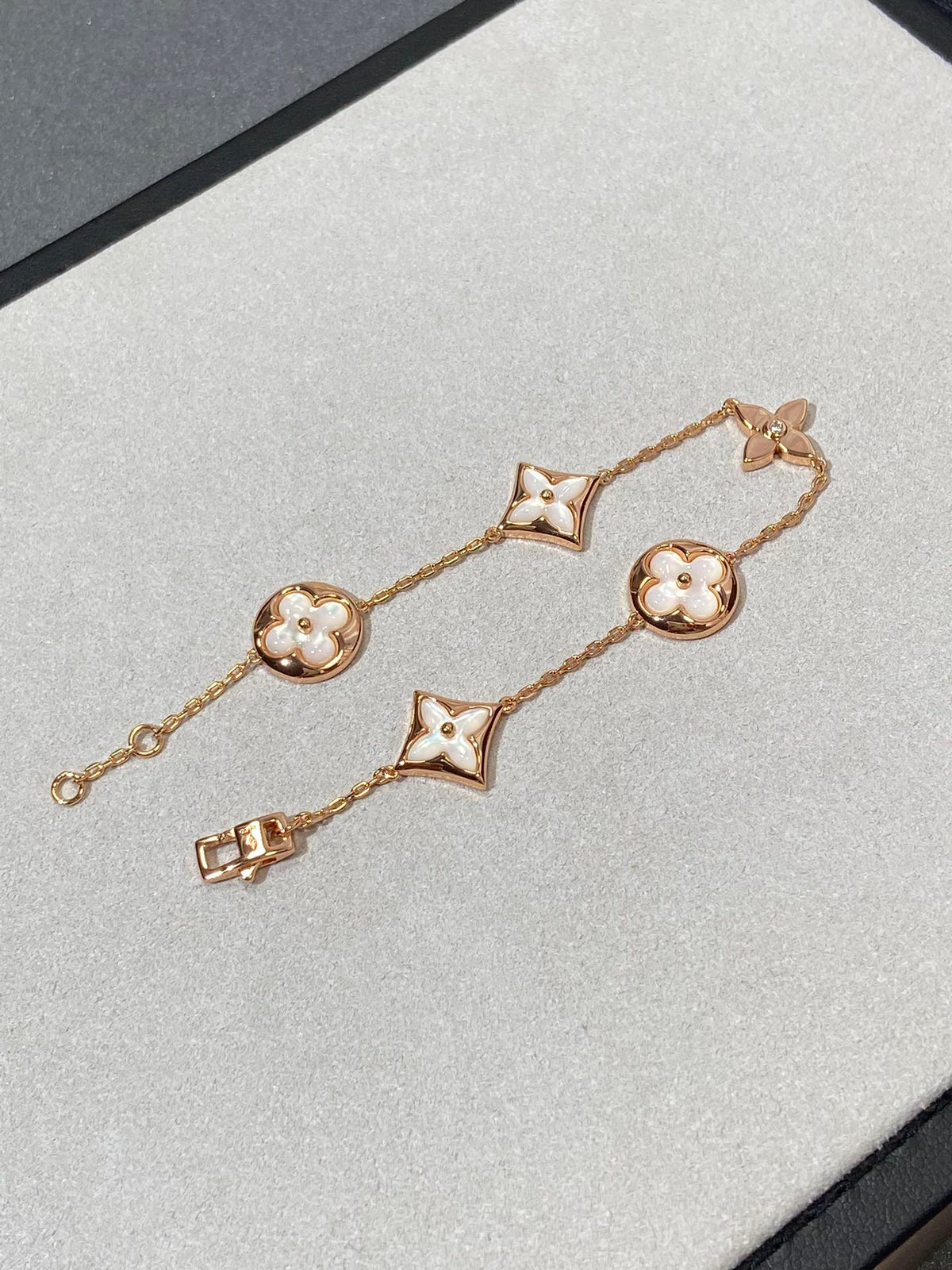 {
  "Elowen jewels": "Elowen jewels",
  "STAR AND SUN 5 MOTIF MOP PINK GOLD BRACELET": "スター＆サン 5モチーフ マザーオブパール ピンクゴールド ブレスレット"
}