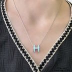 {
  "Elowen jewels": "エロウェン・ジュエルズ",
  "POP H SKY BLUE NECKLACE": "ポップH スカイブルー ネックレス"
}