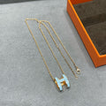 {
  "Elowen jewels": "エロウェン・ジュエルズ",
  "POP H SKY BLUE NECKLACE": "ポップH スカイブルー ネックレス"
}