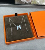 {
  "Elowen jewels": "エロウェン・ジュエルズ",
  "POP H SKY BLUE NECKLACE": "ポップH スカイブルー ネックレス"
}