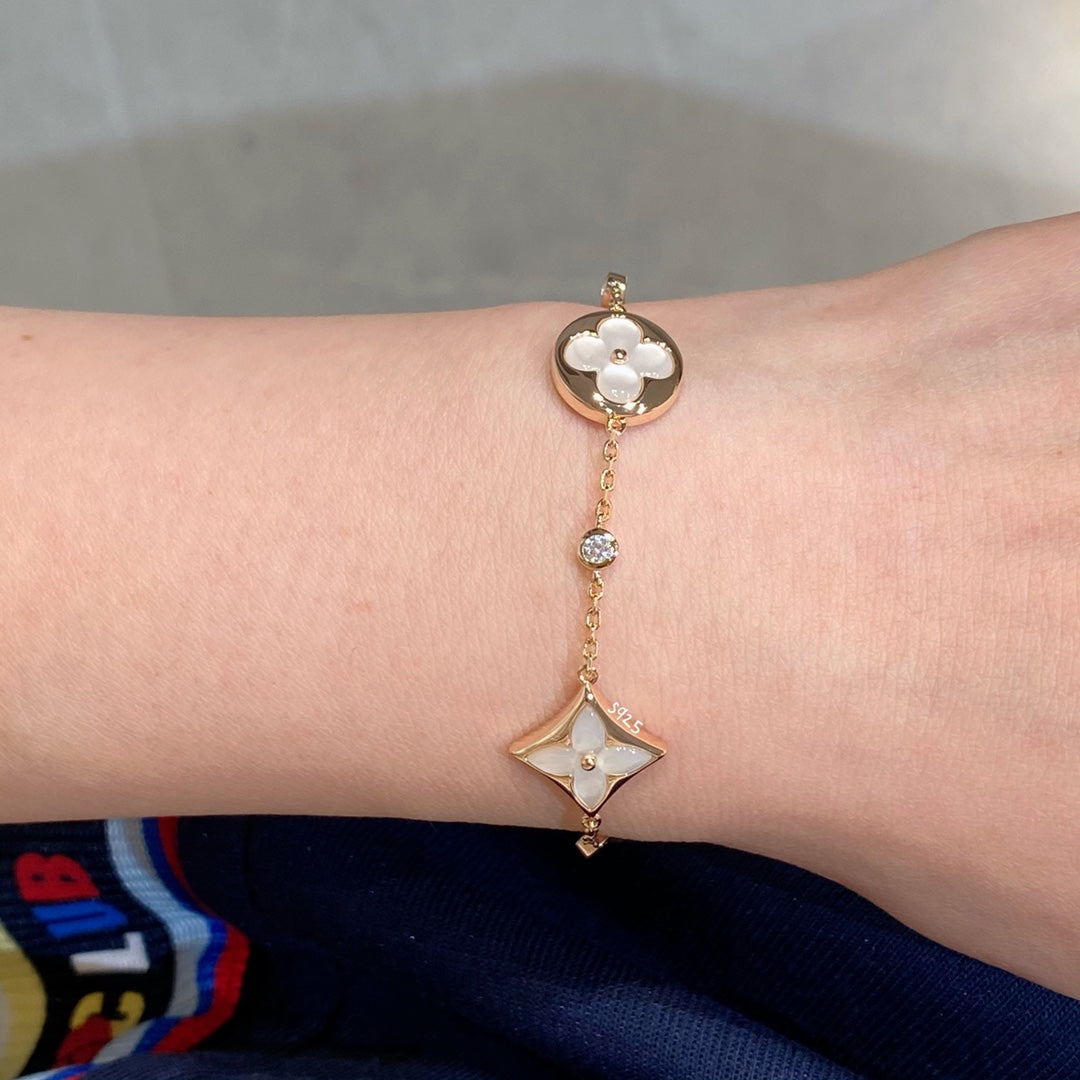 [Elowen jewels ]STAR AND SUN 4 MOTIF WHITE MOP PINK GOLD BRACELET