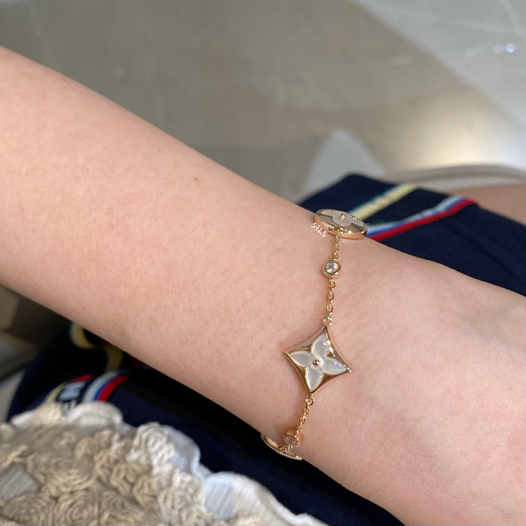 [Elowen jewels ]STAR AND SUN 4 MOTIF WHITE MOP PINK GOLD BRACELET