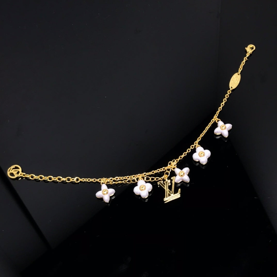 [Elowen jewels ]LOGO 6 MOTIF STAR AND SUN GOLD BRACELET