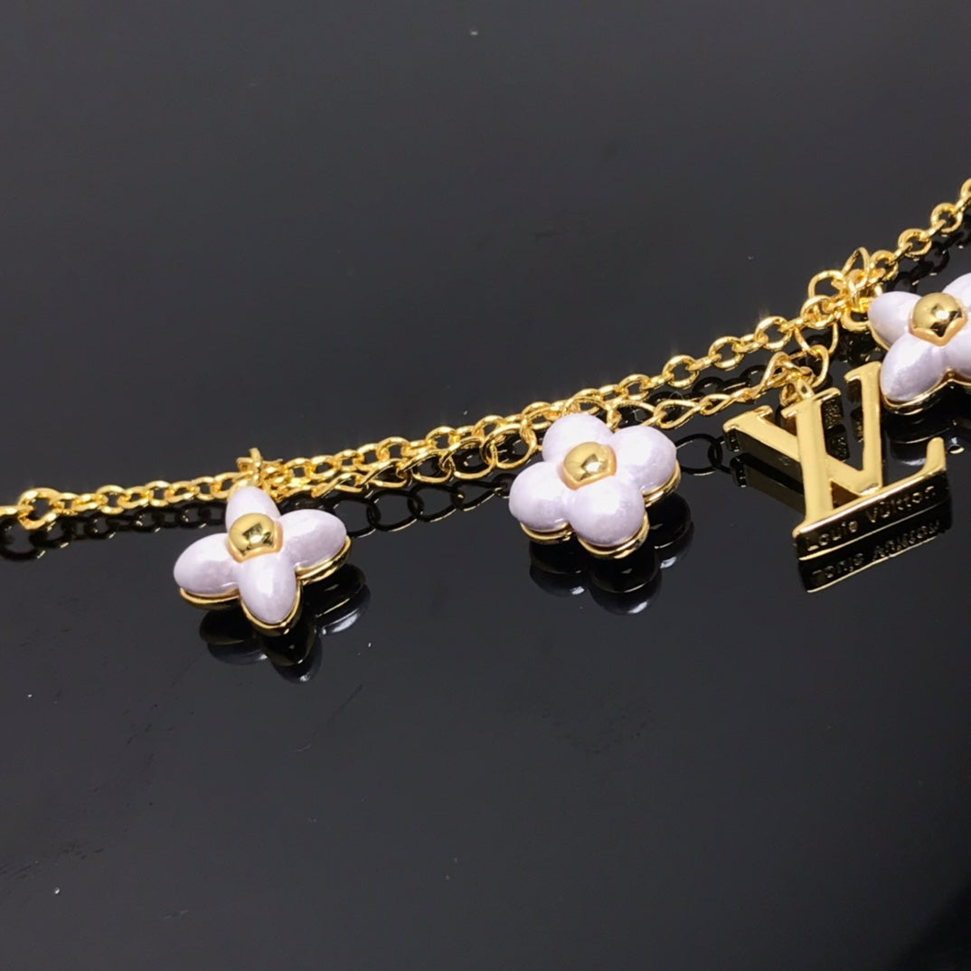 [Elowen jewels ]LOGO 6 MOTIF STAR AND SUN GOLD BRACELET
