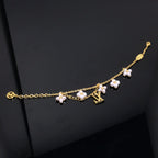 [Elowen jewels ]LOGO 6 MOTIF STAR AND SUN GOLD BRACELET