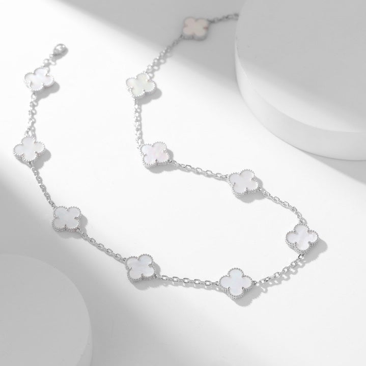 {
"Elowen jewels": "Elowen Schmuck",
"CLOVER 10 MOTIFS WHITE MOTHER OF PEARL NECKLACE": "KLEEBLATT 10-MOTIV-HALSKETTE AUS WEISSEM PERLMUTT"
}