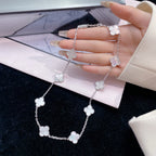 {
"Elowen jewels": "Elowen Schmuck",
"CLOVER 10 MOTIFS WHITE MOTHER OF PEARL NECKLACE": "KLEEBLATT 10-MOTIV-HALSKETTE AUS WEISSEM PERLMUTT"
}