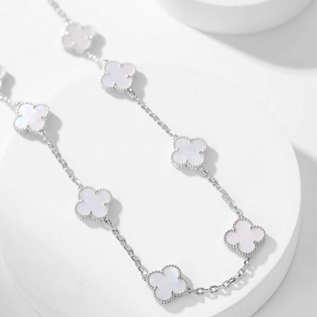 {
"Elowen jewels": "Elowen Schmuck",
"CLOVER 10 MOTIFS WHITE MOTHER OF PEARL NECKLACE": "KLEEBLATT 10-MOTIV-HALSKETTE AUS WEISSEM PERLMUTT"
}