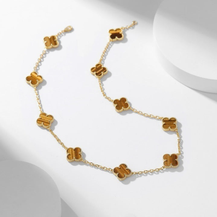 {
  "Elowen jewels": "Elowen jewels",
  "CLOVER 10 MOTIFS TIGER EYE NECKLACE": "クローバー 10モチーフ タイガーアイ ネックレス"
}