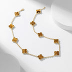 {
  "Elowen jewels": "Elowen jewels",
  "CLOVER 10 MOTIFS TIGER EYE NECKLACE": "クローバー 10モチーフ タイガーアイ ネックレス"
}