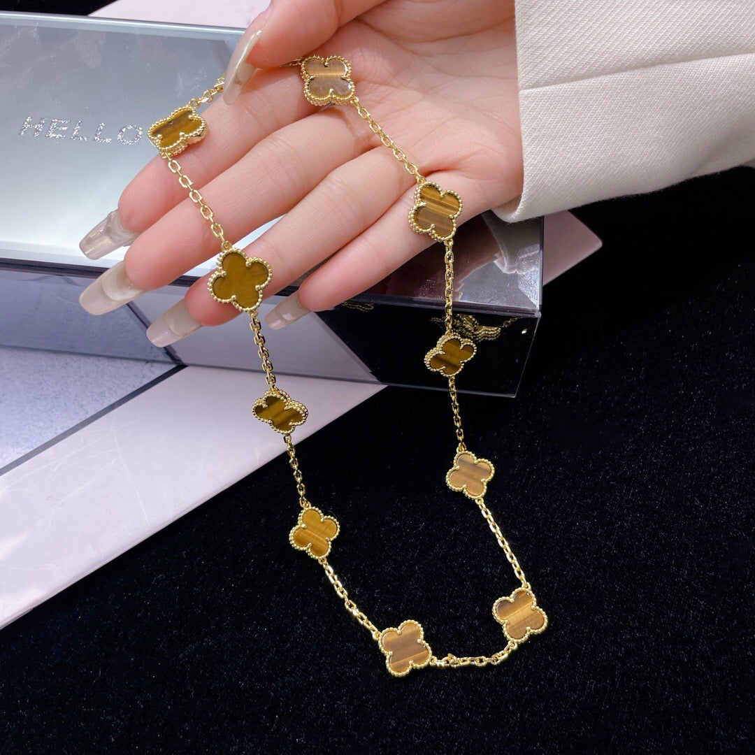 {
  "Elowen jewels": "Elowen jewels",
  "CLOVER 10 MOTIFS TIGER EYE NECKLACE": "クローバー 10モチーフ タイガーアイ ネックレス"
}