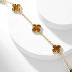 {
  "Elowen jewels": "Elowen jewels",
  "CLOVER 10 MOTIFS TIGER EYE NECKLACE": "クローバー 10モチーフ タイガーアイ ネックレス"
}