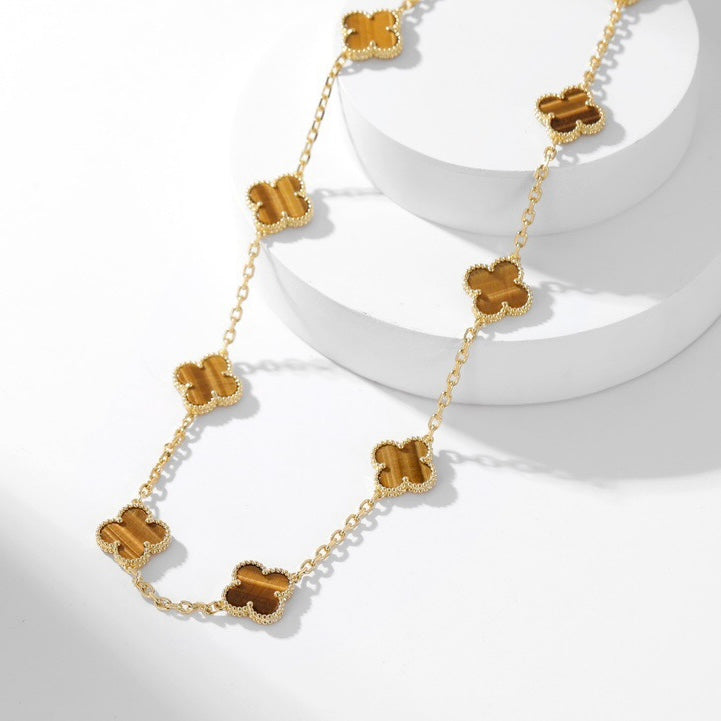 {
  "Elowen jewels": "Elowen jewels",
  "CLOVER 10 MOTIFS TIGER EYE NECKLACE": "クローバー 10モチーフ タイガーアイ ネックレス"
}