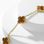 {
  "Elowen jewels": "Elowen jewels",
  "CLOVER 10 MOTIFS TIGER EYE NECKLACE": "クローバー 10モチーフ タイガーアイ ネックレス"
}