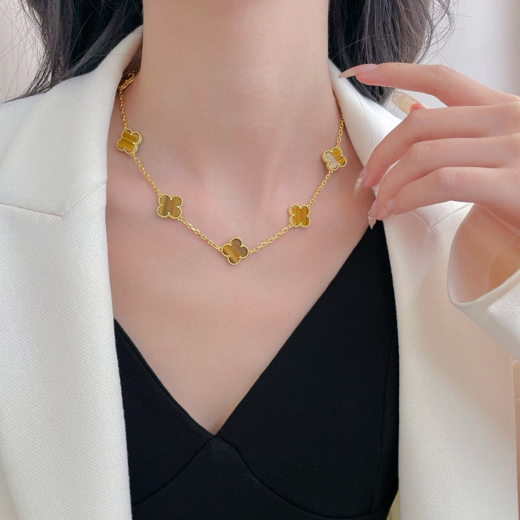 {
  "Elowen jewels": "Elowen jewels",
  "CLOVER 10 MOTIFS TIGER EYE NECKLACE": "クローバー 10モチーフ タイガーアイ ネックレス"
}