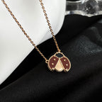 {
"Elowen jewels": "Elowen Schmuck",
"LUCKY CARNELIANS LADYBUG NECKLACE": "GLÜCKSBRINGER MARIENKÄFER-HALSKETTE MIT KARNEOLEN"
}
