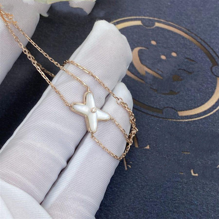 {
  "Elowen jewels": "Elowen jewels",
  "JEUX BRACELET WHITE MOP PINK GOLD 1 DIAMOND": "JEUX ブレスレット ホワイトマザーオブパール ピンクゴールド ダイヤモンド1石"
}