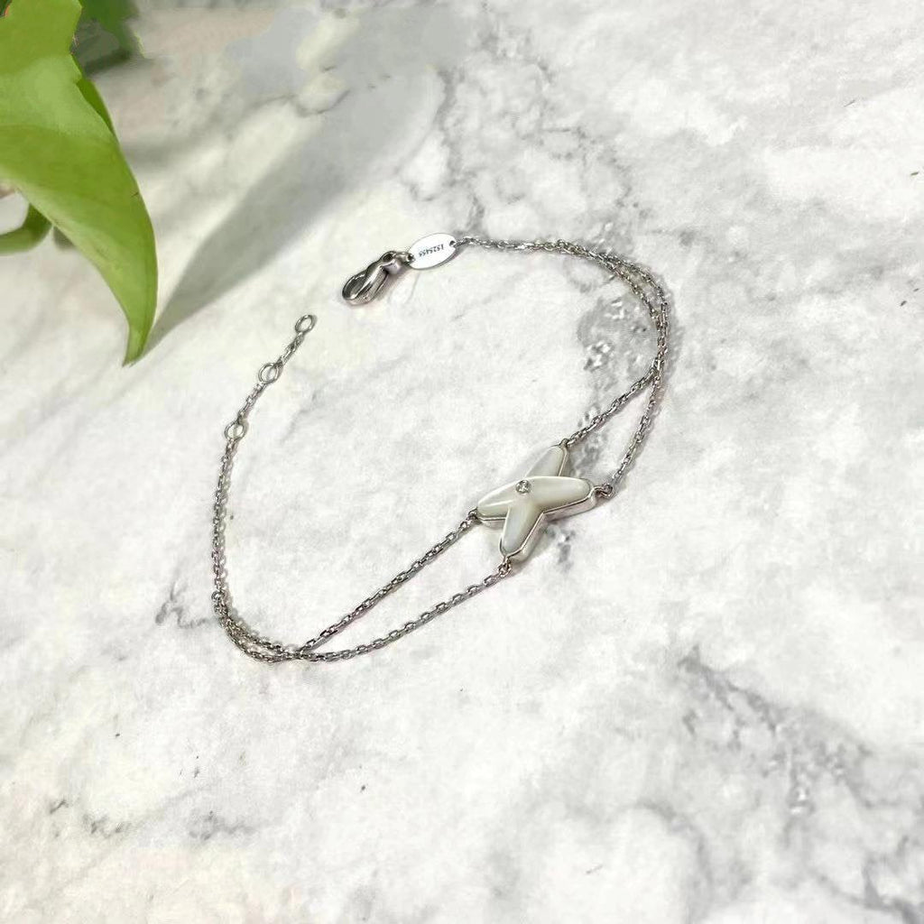 {
  "Elowen jewels": "Elowen jewels",
  "JEUX BRACELET WHITE MOP SILVER 1 DIAMOND": "JEUX ARMBAND WEISSES PERLMUTT SILBER 1 DIAMANT"
}