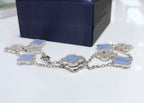 {
  "Elowen jewels": "Elowen jewels",
  "CLOVER 10 MOTIFS CHALCEDONY DIAMONDS SILVER NECKLACE": "クローバー 10モチーフ カルセドニー ダイヤモンド シルバーネックレス"
}
